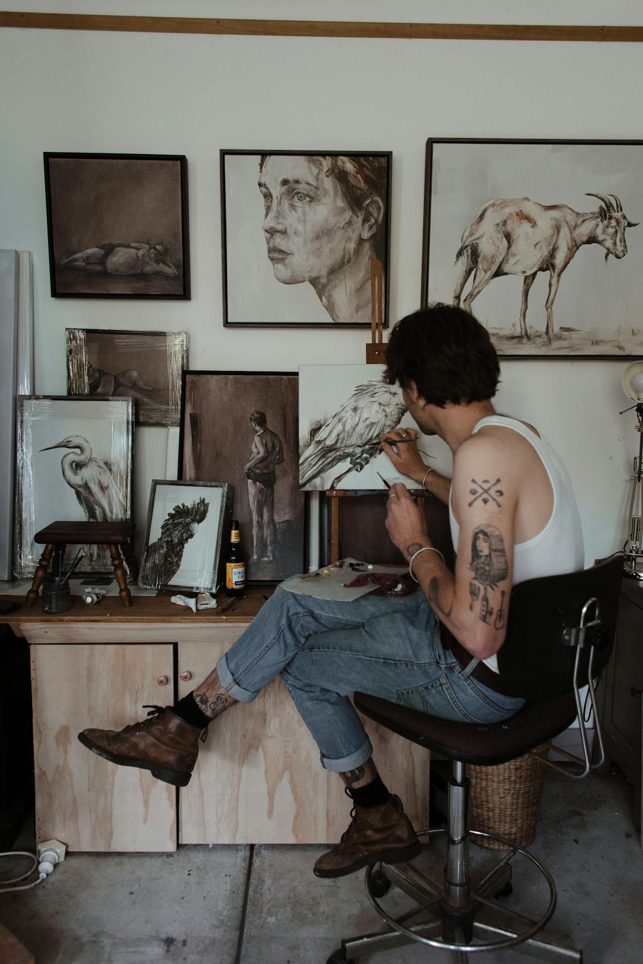 "Unrecognizable man painting in creative workshop" by Rachel Claire on Pexels
